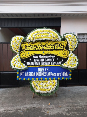 Papan Bunga Duka di Taban