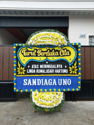 Papan Bunga Duka di Taban