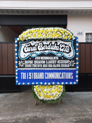Papan Bunga Duka di Taban